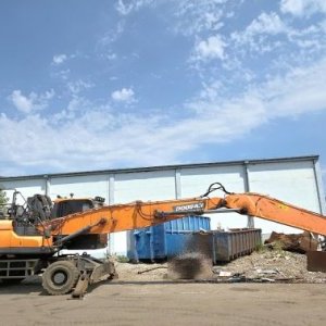 foto 25.5t bagr překládka Doosan DX250 WMH5 (DEVELON) kolové rypadlo handler